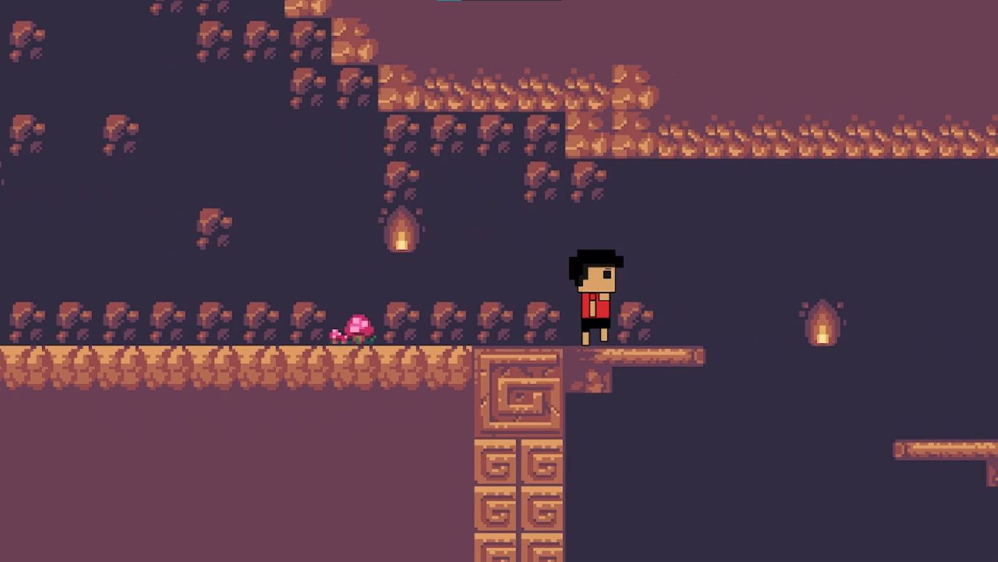 2D side view of a dark cave with brown rocks.